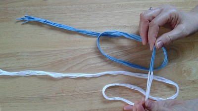Link the two different coloured groups of strings together
