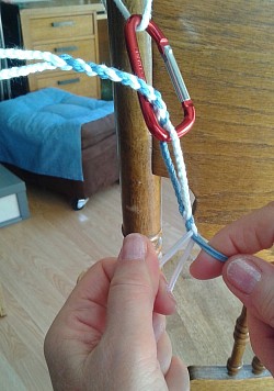 As you progress with plaiting, reposition the sisith up on the hook